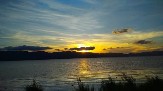 Sunset over Lake Mainit from Kitcharao, Agusan del Norte