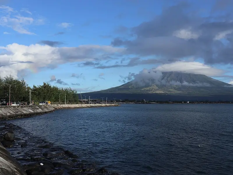Legazpi Boulevard by the sea with Mayon Volcano in view