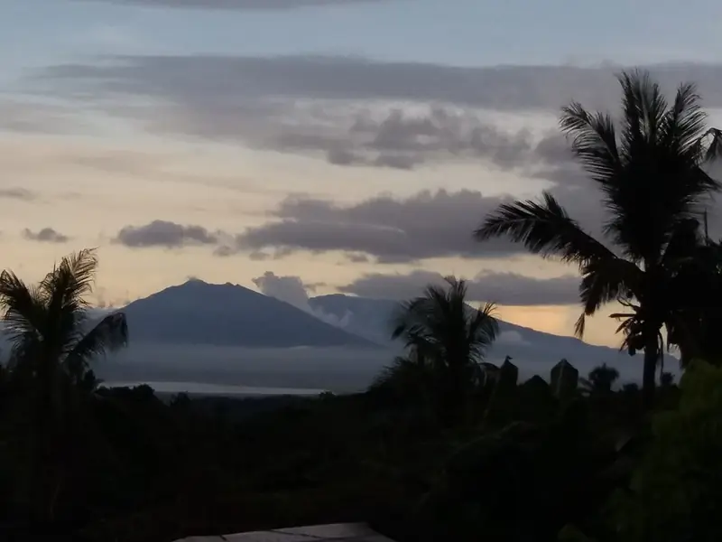 The silhouette of Mount Isarog at dusk, seen from Minalabac
