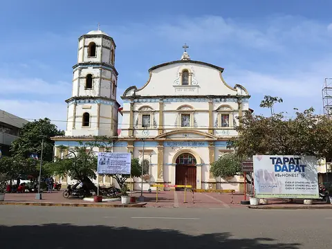 White facade and bell tower of the Immaculate Conception Metropolitan Cathedral, Roxas City