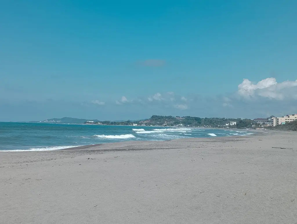 Surf rolling onto San Juan Beach, La Union