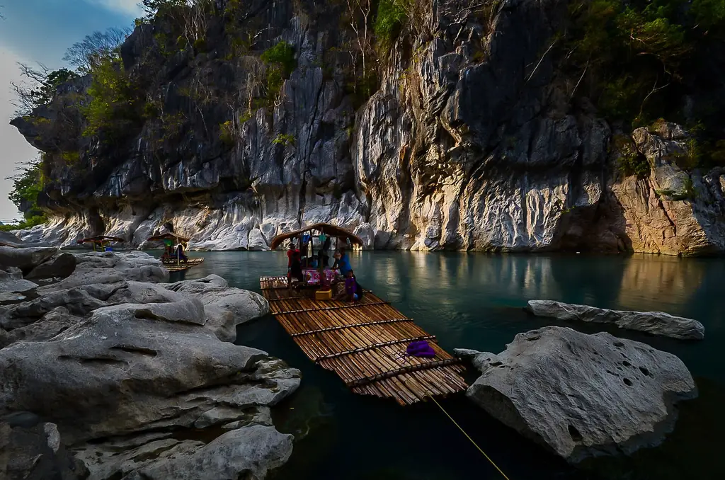 Limestone walls and bamboo rafts on the Peñaranda River, Minalungao National Park