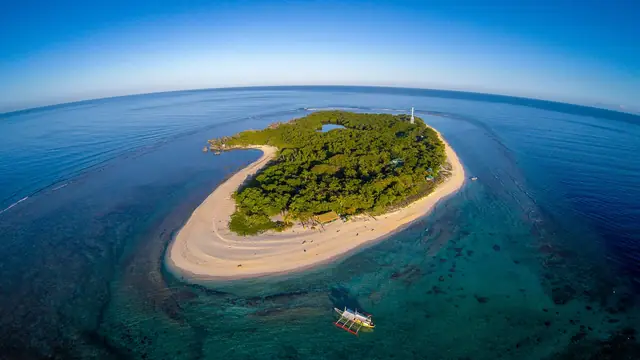 Apo Island and its reef in Apo Reef Natural Park, from the air
