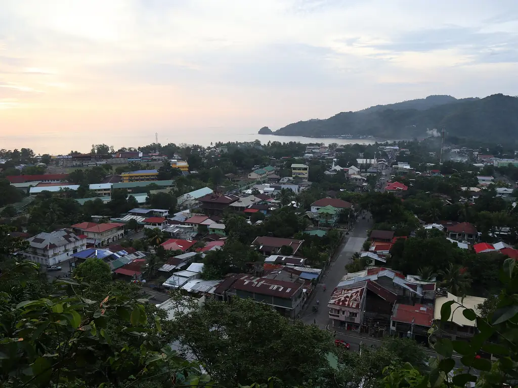 Rooftops of Dapitan City and the bay seen from Ilihan Hill
